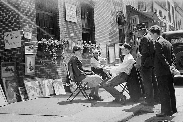 Un artista realiza un retrato durante el Washington Square Art Show de 1937